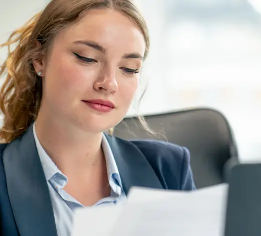 Prevent Employee Lawsuits with EPLI HR manager reading legal documents