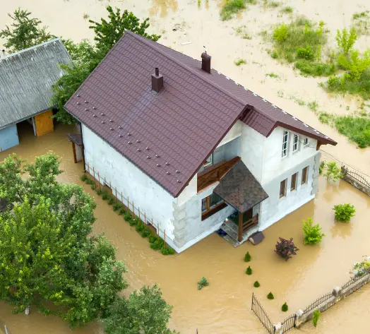 Flood insurance for homeowners Home damaged by flood waters