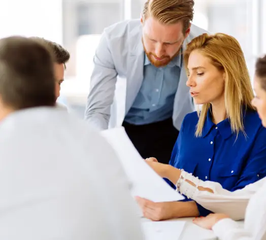 Employment Liability Coverage for Businesses Business team reviewing HR policy