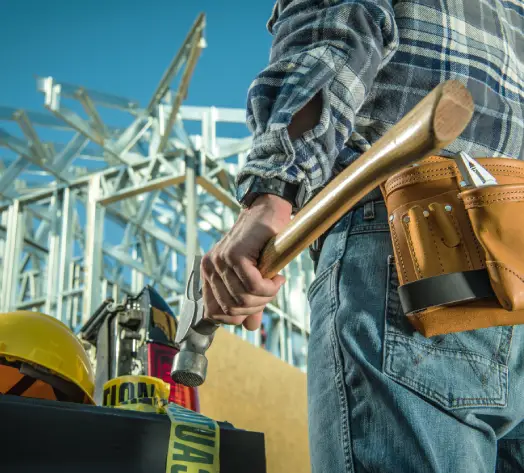 Protect Tools and Equipment Worker securing tools at job site